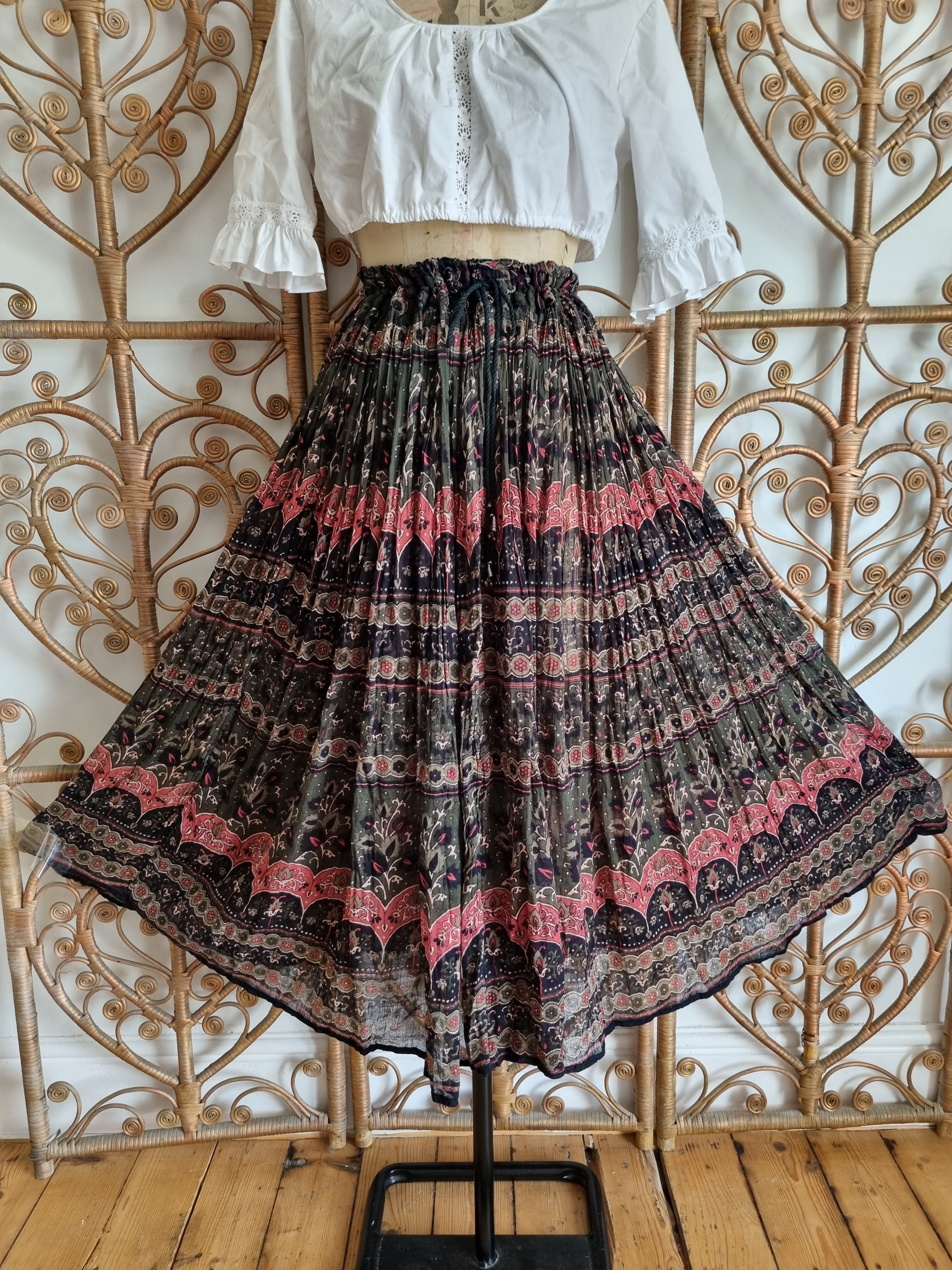 Block Printed Crinkle Skirt - MIxed Indigo with floral patterns. Red Border  - Camilla Costello