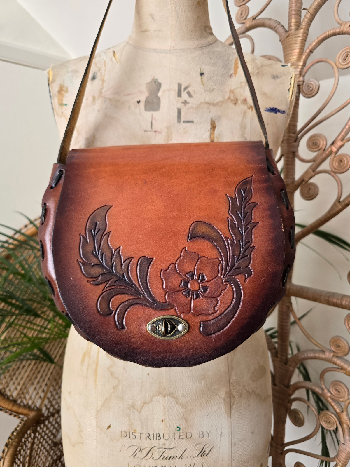 Vintage flower tooled leather bag